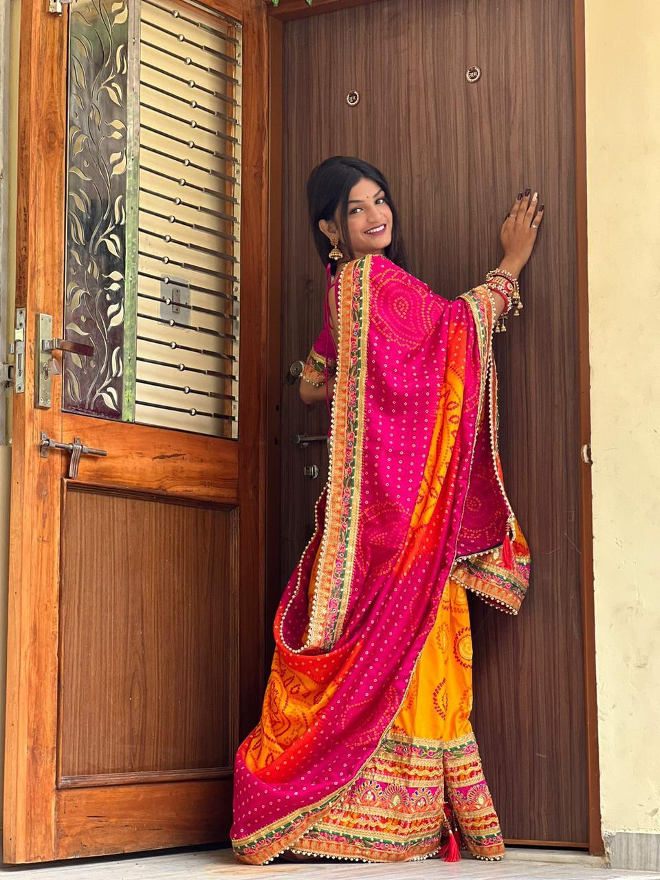 "Royal Bandhej Elegance – Original Moss Chiffon Saree with Heavy Gotta Patti & Pearl Lace Border"