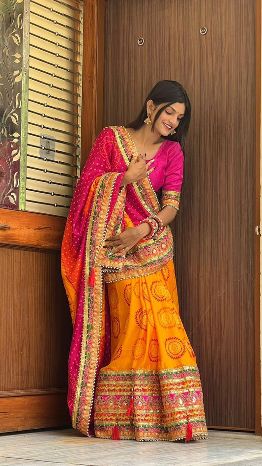 "Royal Bandhej Elegance – Original Moss Chiffon Saree with Heavy Gotta Patti & Pearl Lace Border"